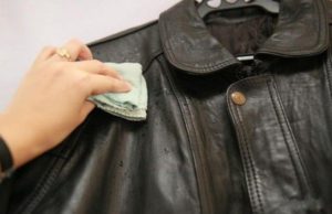 Wiping a leatherette jacket