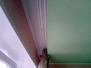 Attaching curtains to the ceiling