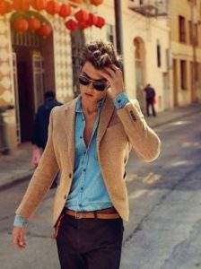 Men's brown jacket with blue shirt