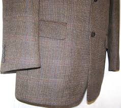 Butxaques de la jaqueta de tweed