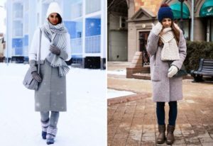 Voluminous winter scarves under a gray coat