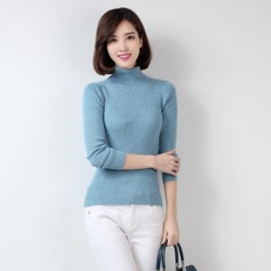 Blue turtleneck with white trousers