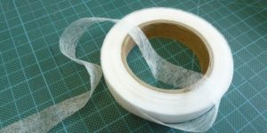 Web-tape for felling av bukser