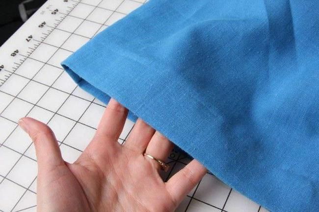 Hemming trousers by hand