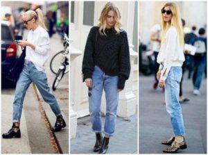 combinación de jeans y botas para mujer