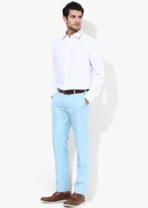 blue trousers and white shirt