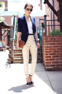 blue jacket with beige trousers