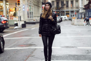 black short down jacket and black pants