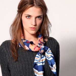 girl in a scarf around her neck