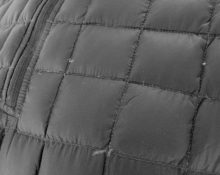 poor quality seams on the down jacket