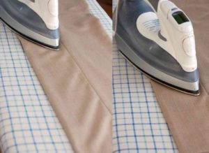 smoothing out creases on trousers