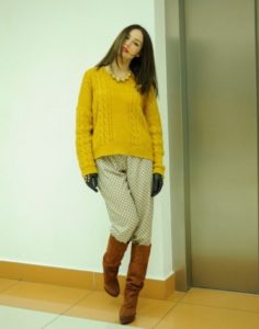 mustard sweater with high boots