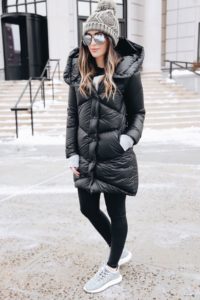 gray knitted hat with black down jacket