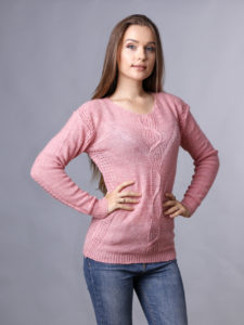 light pink sweater and jeans