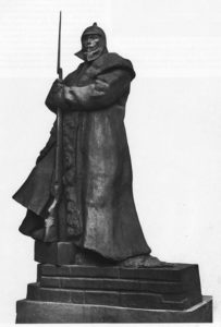 Monument with a soldier in a sheepskin coat