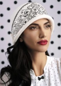 White hat with dark ornaments