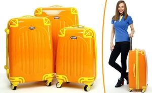 three yellow suitcases