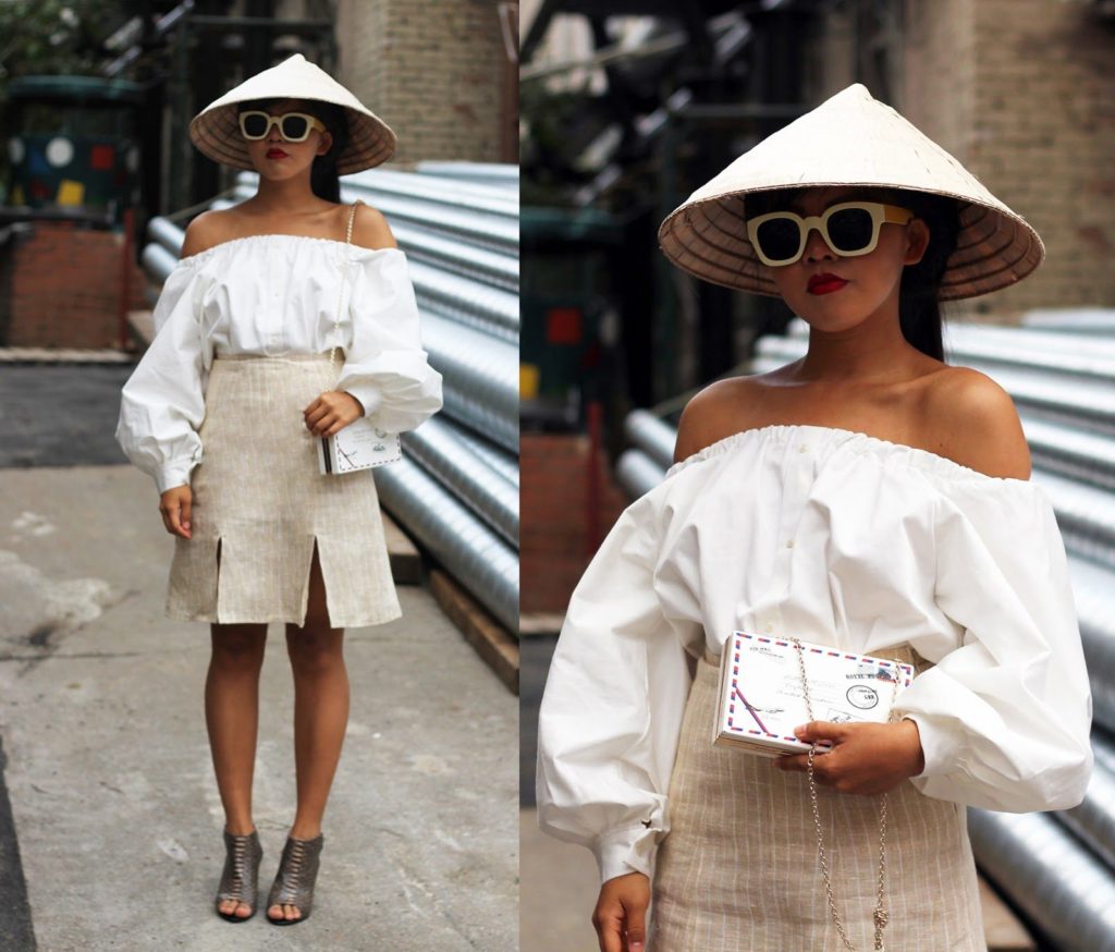 Vietnamese hat on a modern girl