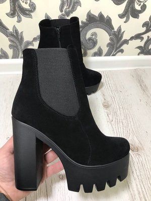 Black ankle boots with inserts