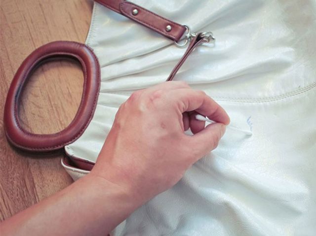 Cleaning a white bag 