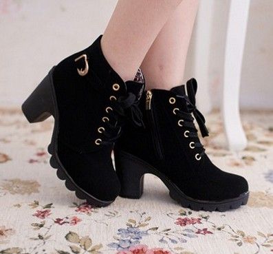 Black lace-up ankle boots with tractor sole