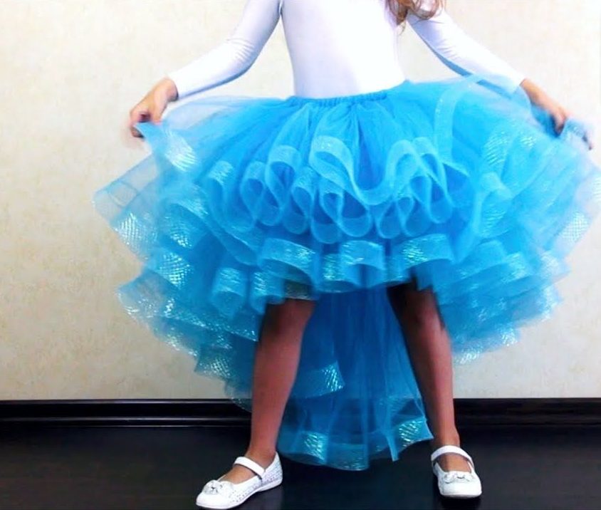 Blue tulle children's dress with a train