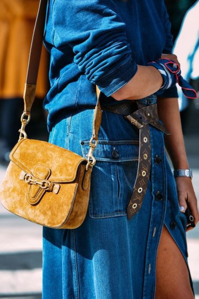 yellow bag under a denim dress