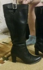 woman in cowhide boots