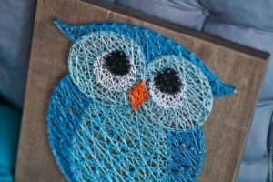 owl made of threads and nails