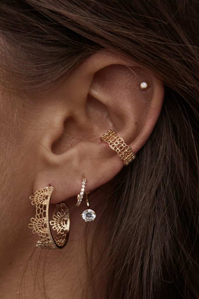 different earrings on the ear