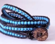 Bracelet en forme de huit en cuir et perles