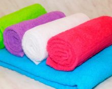 Colored towels folded in a roller