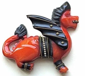 broche de dragão em baquelite