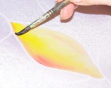 Painting fabric using a glue outline