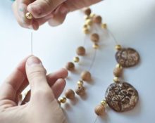 stringing beads on a thread