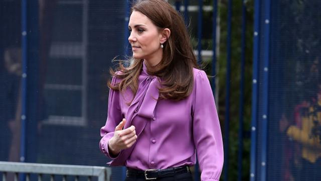 Why did Kate Middleton wear her blouse backwards?