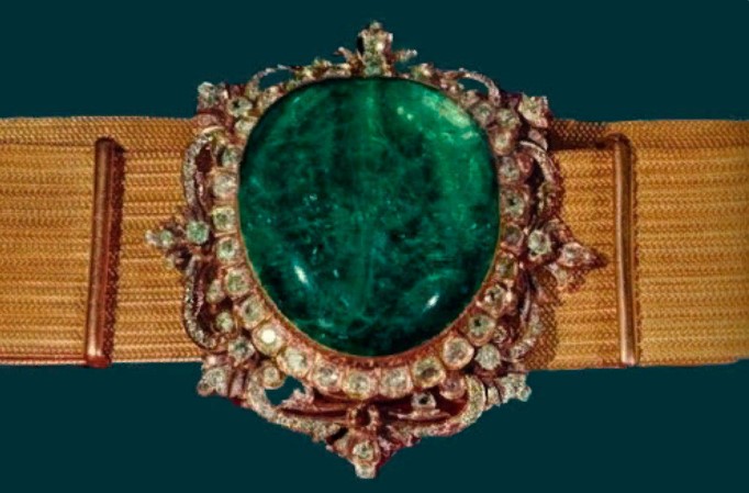 emerald and diamond buckles on a sheikh's belt