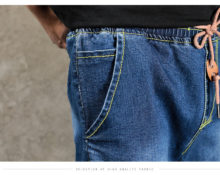 Why do men wear a cord on their belt?