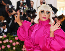 Why did Lady Gaga wear three dresses at once?