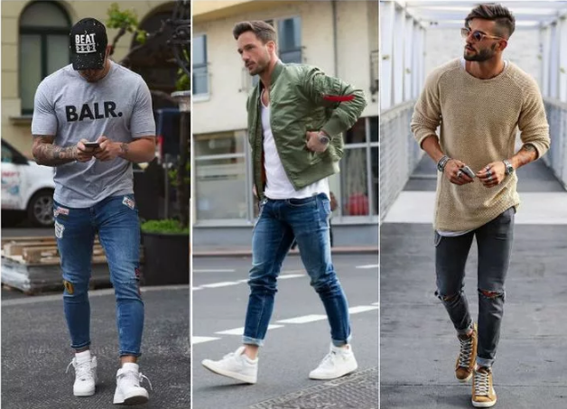 i jeans strappati da uomo si arrotolano