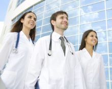 Why do doctors wear white coats?