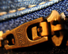 What do the letters YKK on zippers mean?