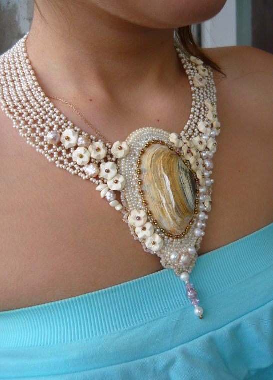 Necklace with shell.