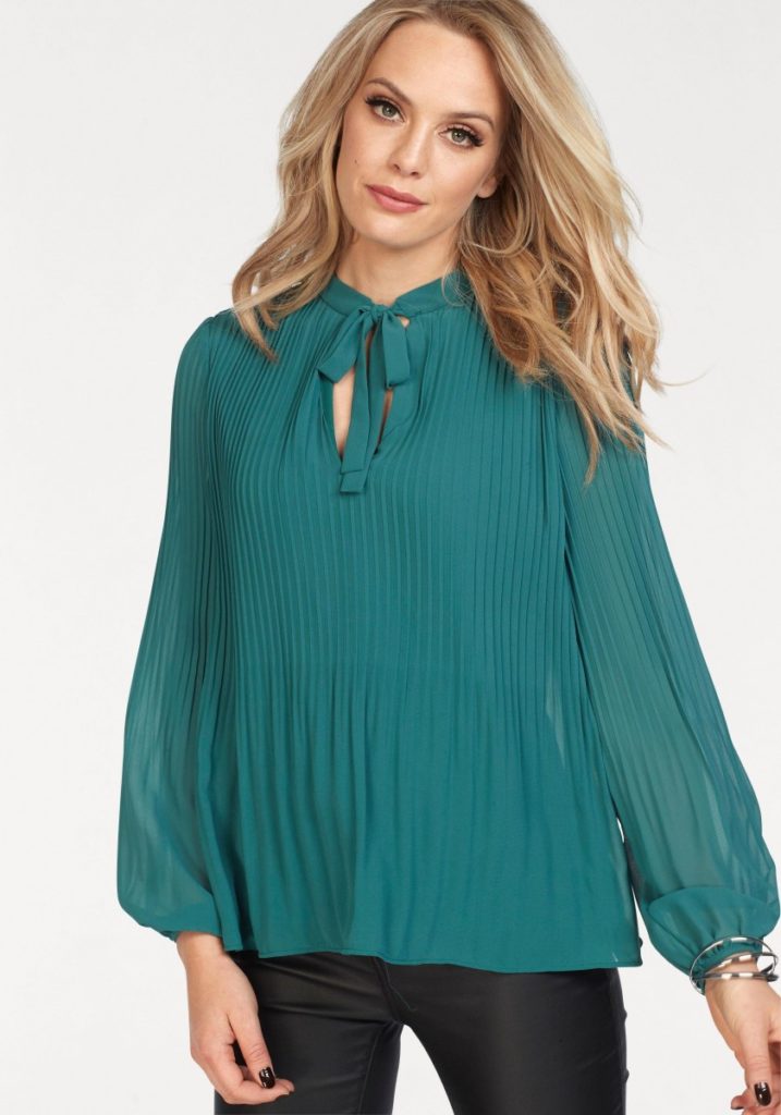 Pleated na blusa.