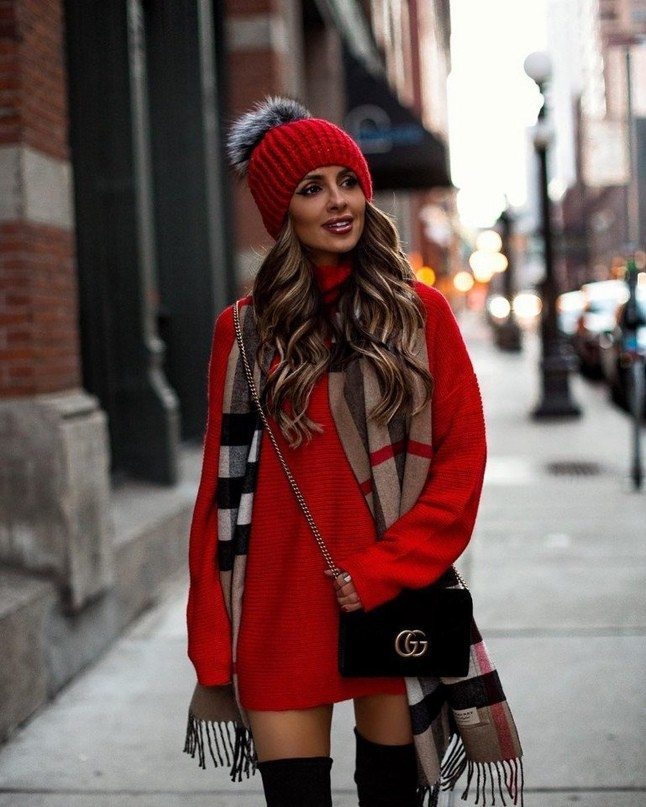 Long red sweater.