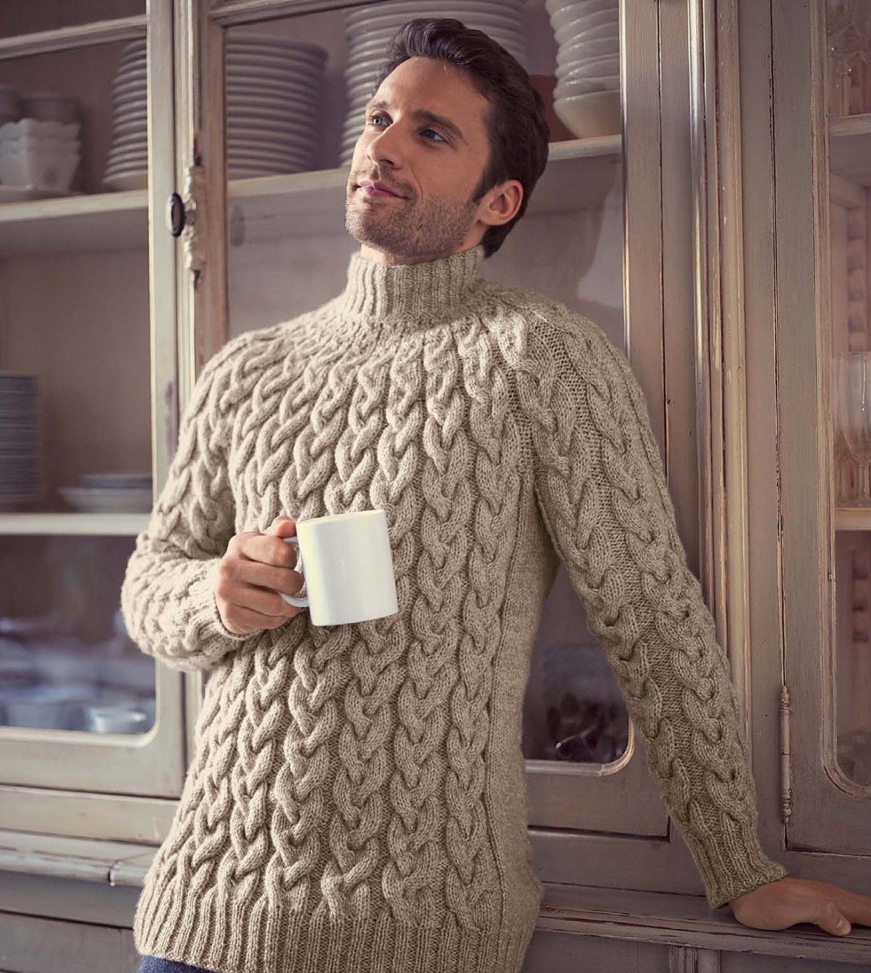 Knitted sweater with a voluminous pattern.