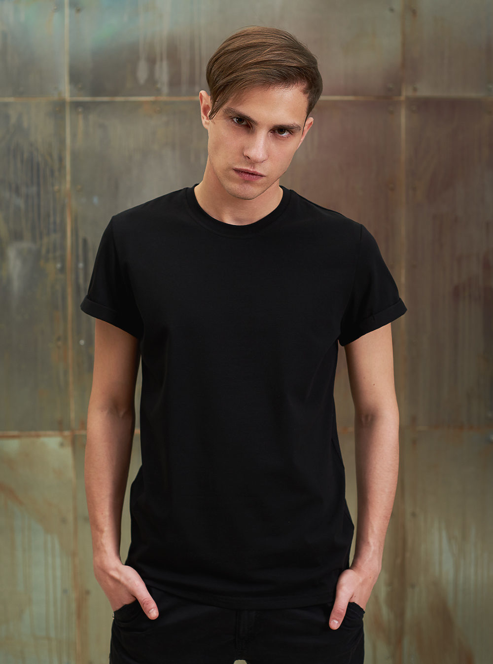 A man in a black T-shirt.