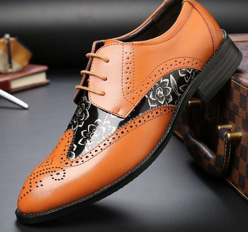 Men's shoes with printed details.