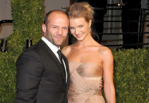 Statham with his wife