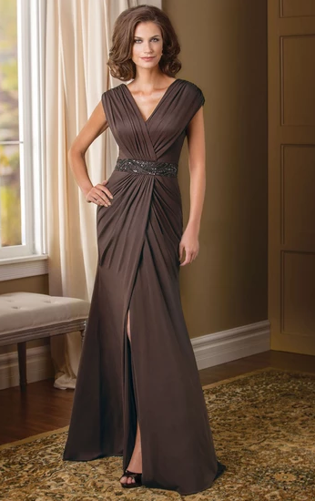 Floor-length brown dress.